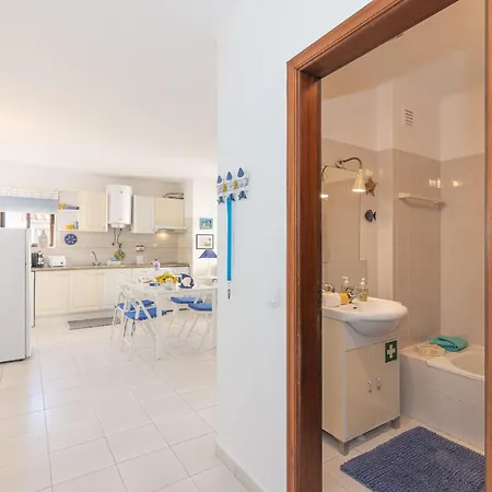 Colunas - Silhueta Citadina Портиман